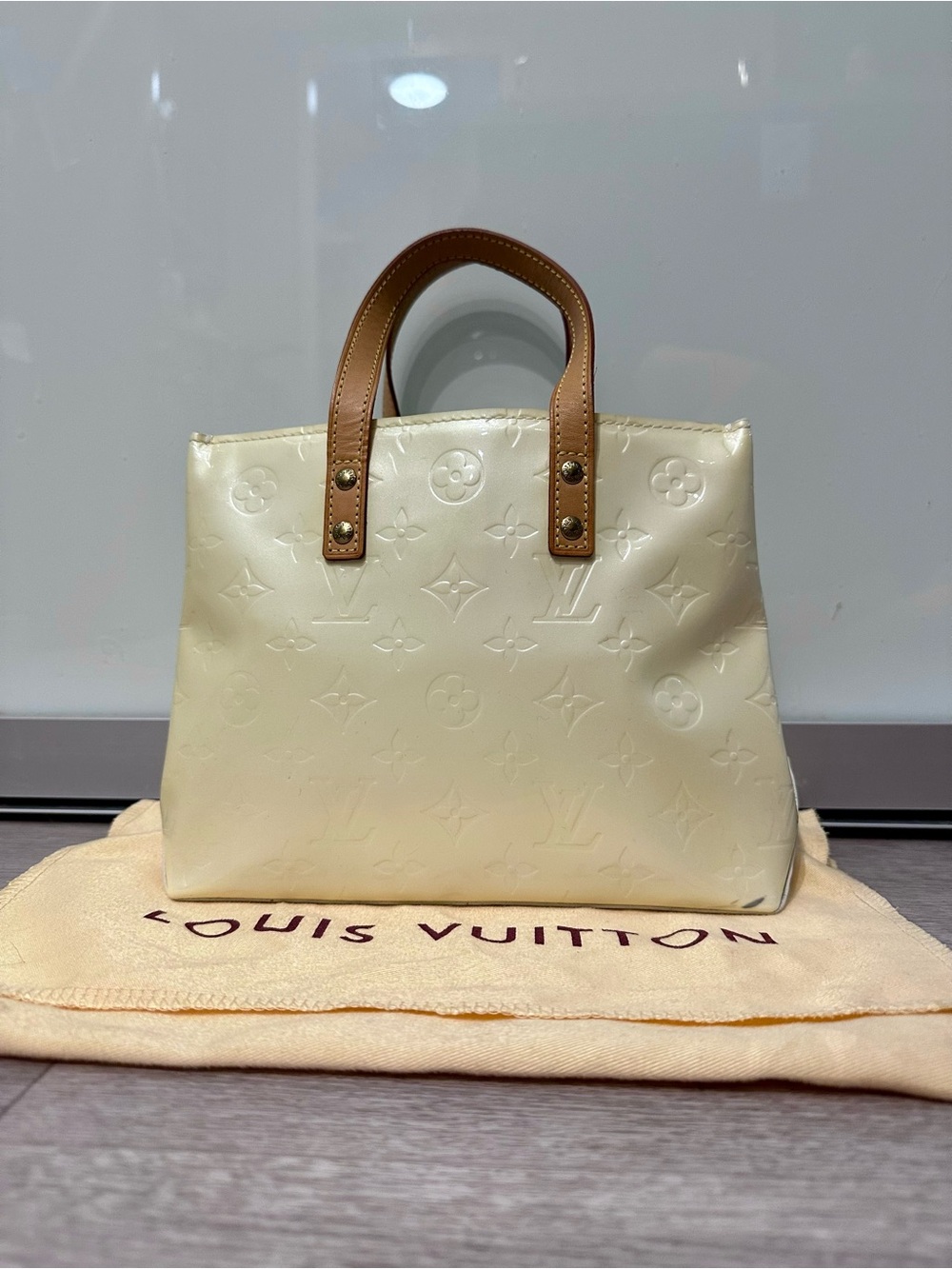 Authentic vintage Louis Vuitton Monogram Vernis Reade PM in the Perle